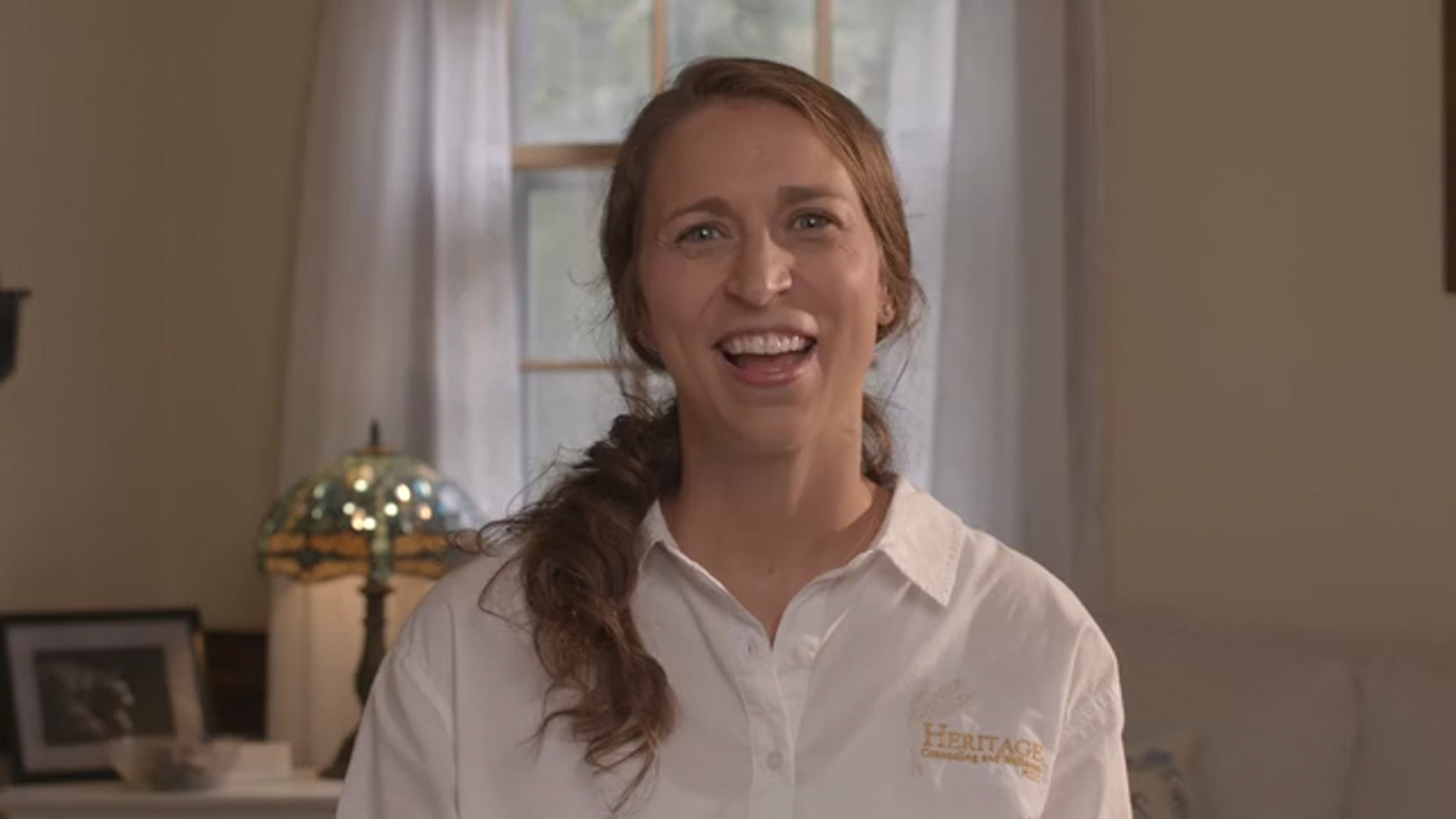 Laura F Baker